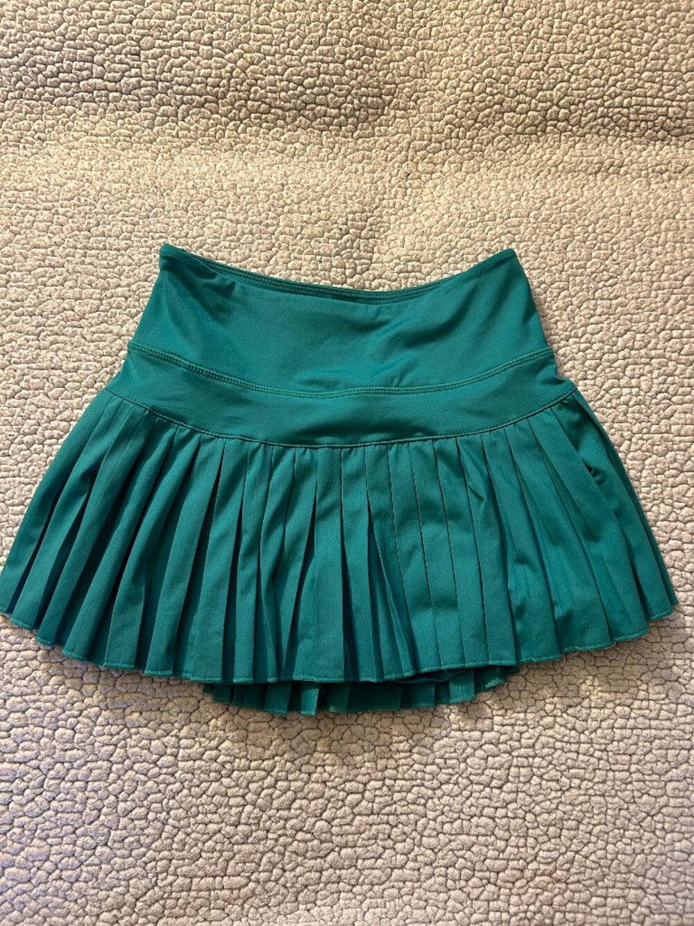 Goldhinge -- teal tennis skirt, pleated, shorts underneath